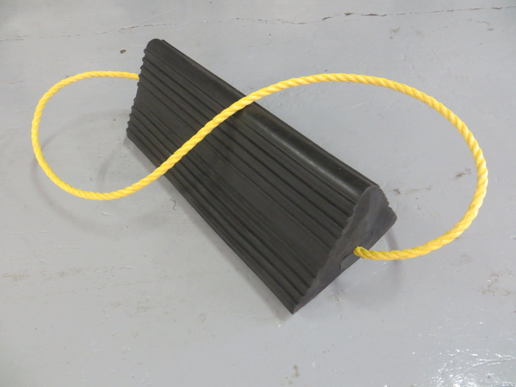 Heavy-duty rubber aircraft wheel chock with yellow carry rope